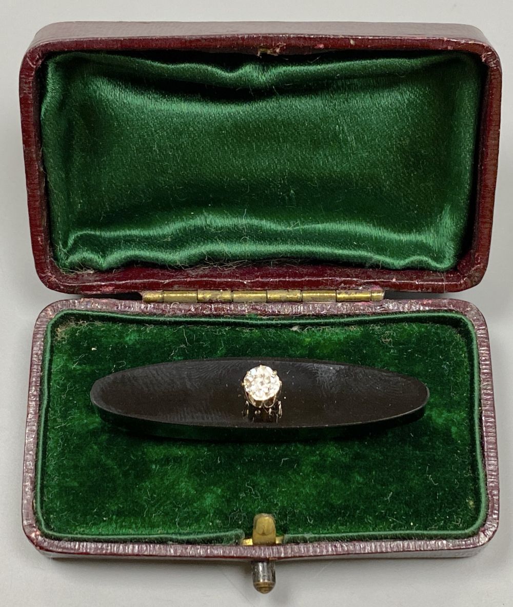 An early 20th century Russian 56 zolotnik yellow metal, black onyx and diamond set oval brooch, 43mm, gross 7.5 grams.